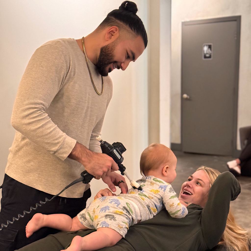 Dr. Denis Chang giving pediatric care treatment